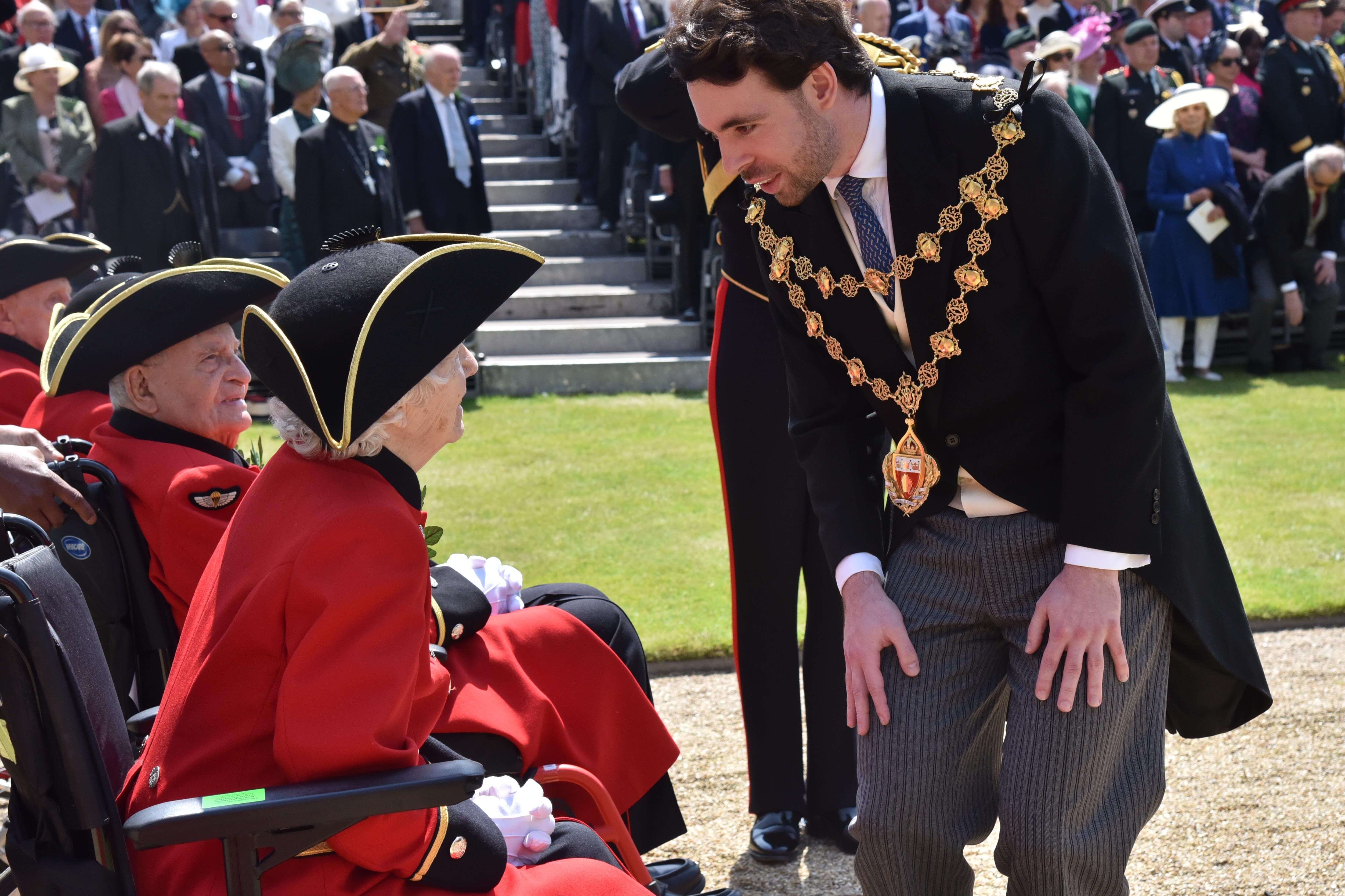 The Worshipful The Mayor of Kensington and Chelsea talks to Chelsea Pensioners during the annual Founder's Day Parade at The Royal Hospital Chelsea - June 2024