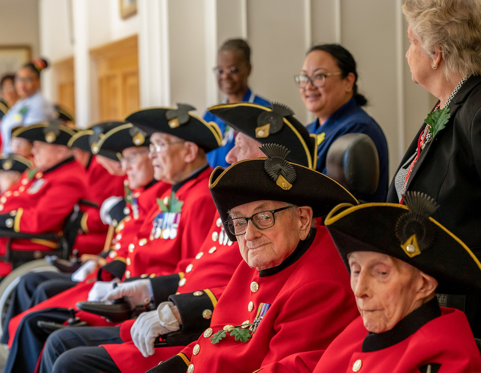 row of Chelsea Pensioners in uniform