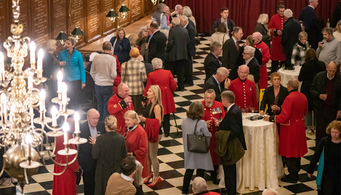 Supporters join the Chelsea Pensioners at a gathering in the Great Hall at the Royal Hospital Chelsea