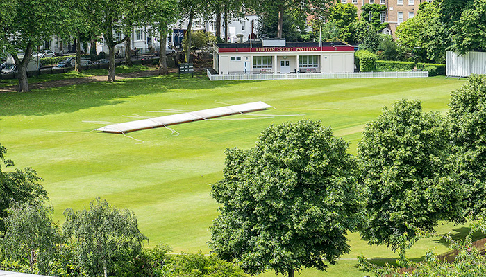 Cricket ground at Burton Court - Royal Hospital Chelsea, with the Pavilion in the distance.