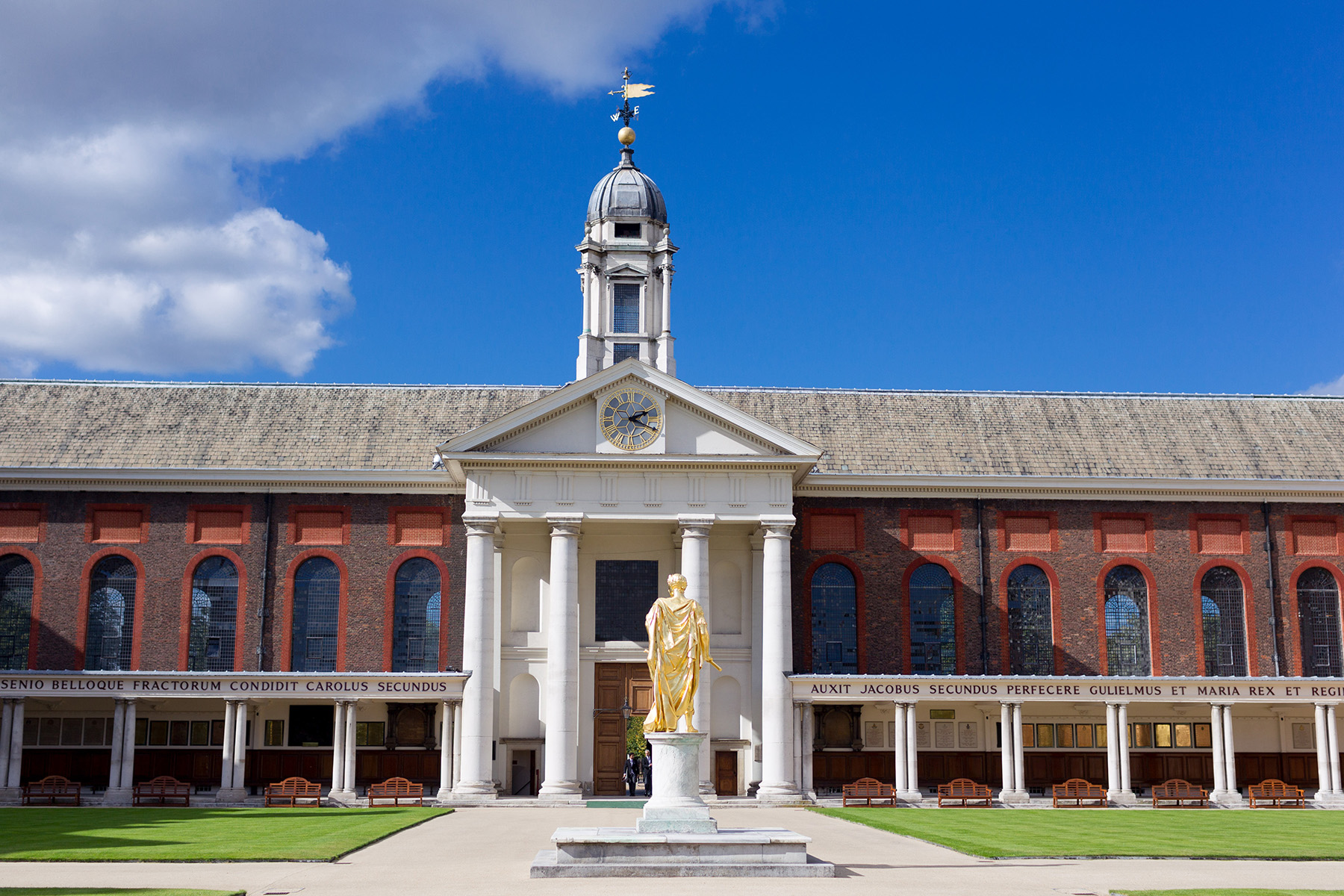 The colonnade in front of the Great Hall to the left and the Chapel to the right of the main entrance was part of the original Wren building.  