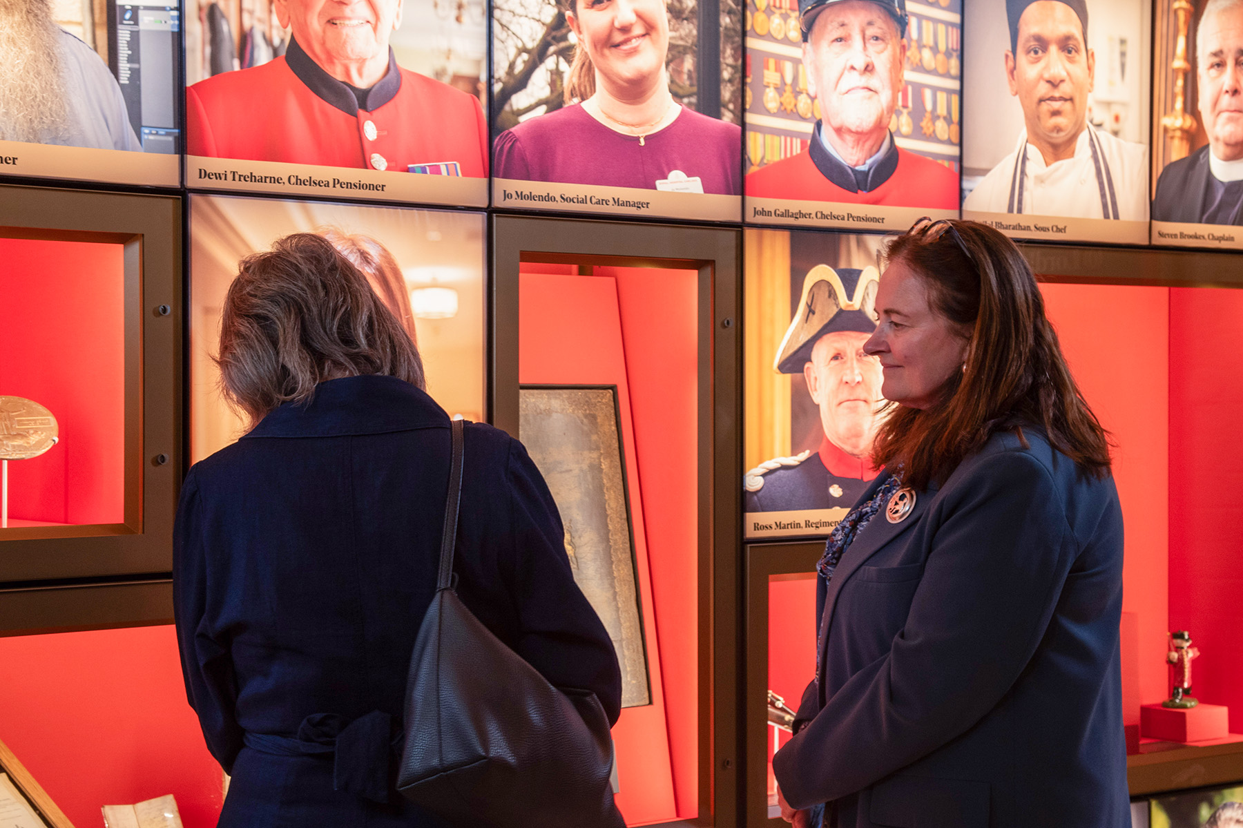 Visitors inspect the displays at the Chelsea Pensioners Museum in the Soane Stable Yard.