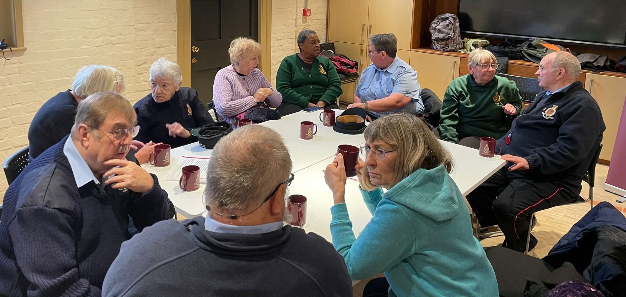 Veterans gather to share a coffee during our drop-in session