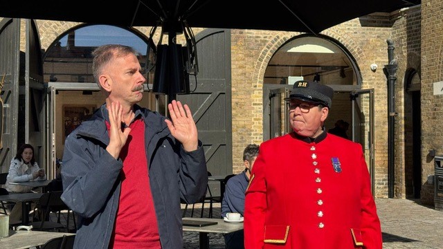 Edward Richards on a British Sign Language tour of the Royal Hospital Chelsea.