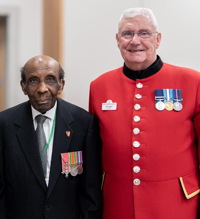 Chelsea Pensioner standing alongside a decorated British Military veteran
