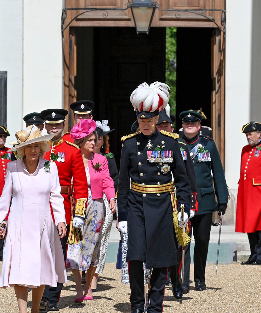 Queen Camilla arrives for Founder’s Day celebrations at the Royal Hospital Chelsea, accompanied by senior representatives as Chelsea Pensioners line Figure Court.