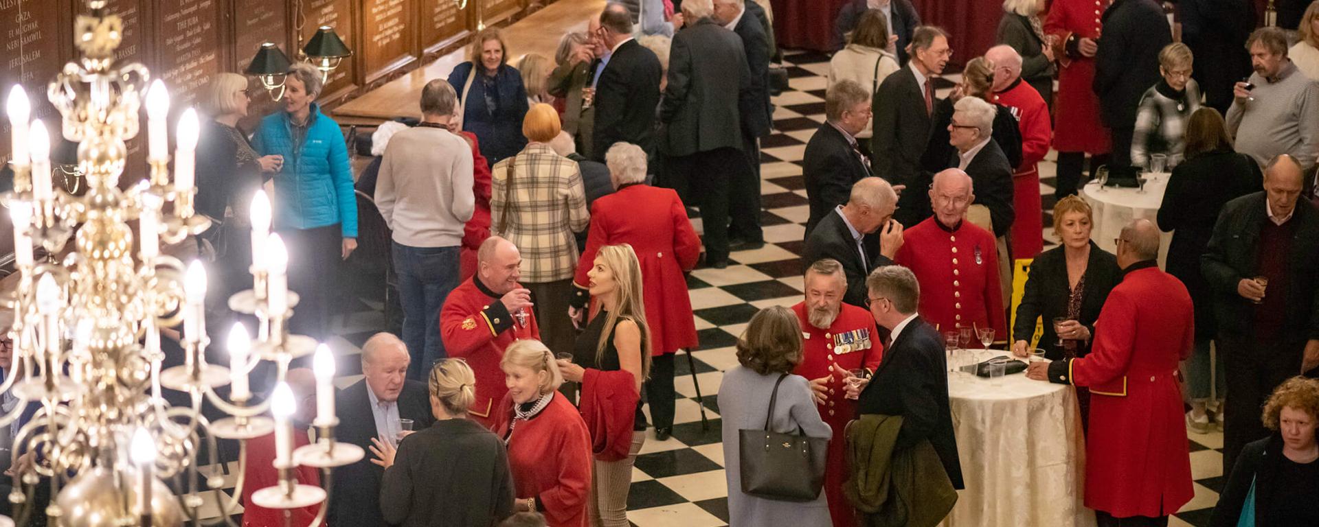 Supporters of the Royal Hospital Chelsea gather in the Great Hall