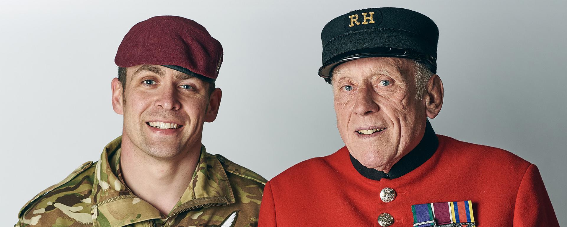 Chelsea Pensioner standing alongside a serving British Army Paratrooper