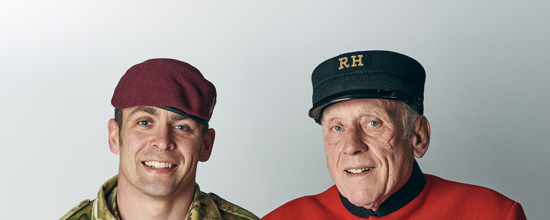 Chelsea Pensioner standing alongside a serving British Army Paratrooper