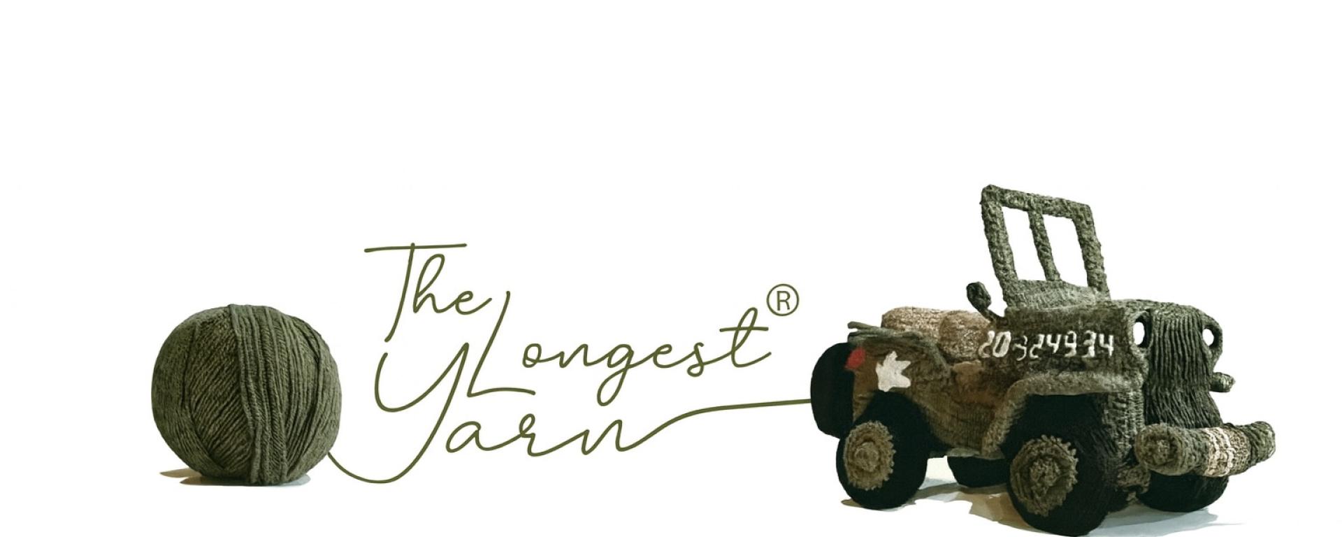 The Longest Yarn logo: a ball of khaki wool beside a hand-knitted military jeep, with the tagline 'A Threadthrough History'