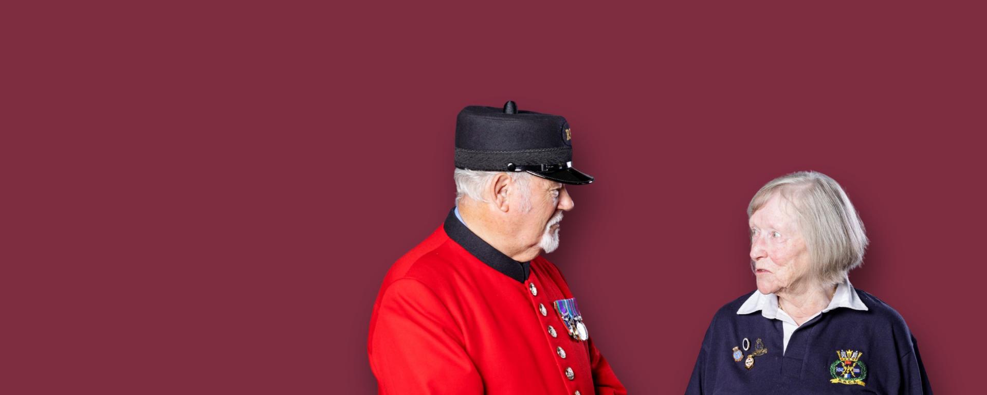 An image of a Chelsea Pensioner and a Veterans Outreach team member