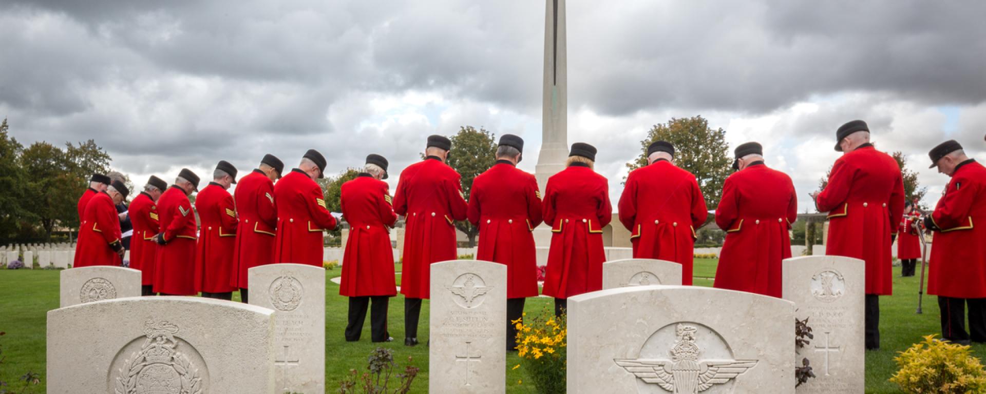 An image of Chelsea Pensioners bowing their heads in respect at a Remembrance event