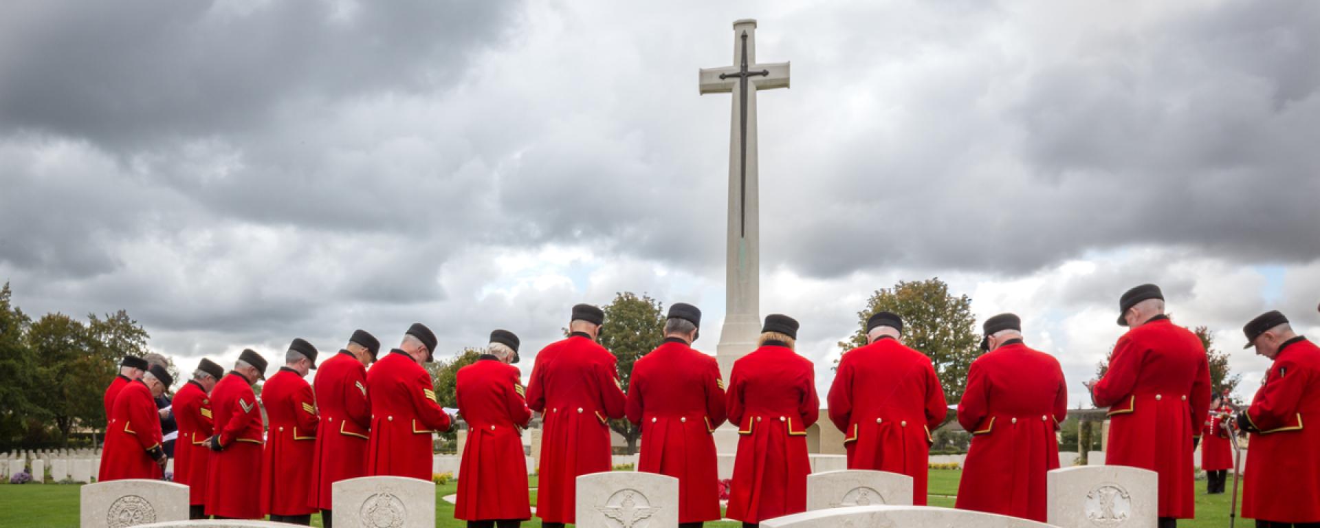 An image of Chelsea Pensioners bowing their heads in respect at a Remembrance event