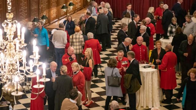 Supporters join the Chelsea Pensioners at a gathering in the Great Hall at the Royal Hospital Chelsea