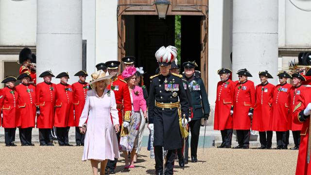 Queen Camilla arrives for Founder’s Day celebrations at the Royal Hospital Chelsea, accompanied by senior representatives as Chelsea Pensioners line Figure Court.