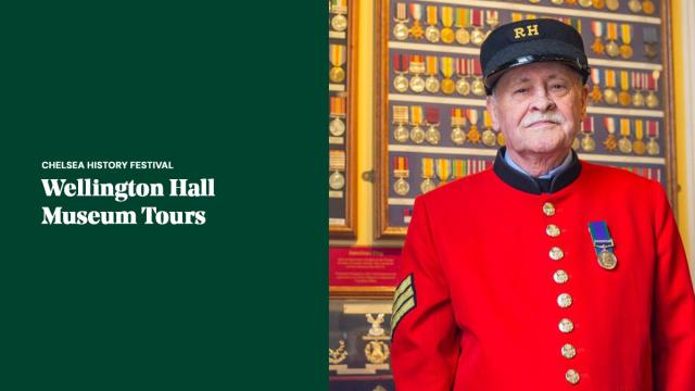 Chelsea Pensioner standing in Wellington Hall at the Royal Hospital Chelsea, surrounded by military medals and museum displays during a guided history tour.
