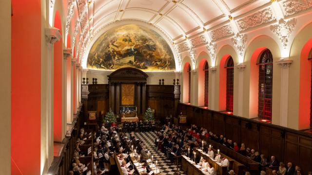 An iamge of the Army Chapel Service singing Christmas carols in the Sir Christopher Wren Chapel at Royal Hospital Chelsea